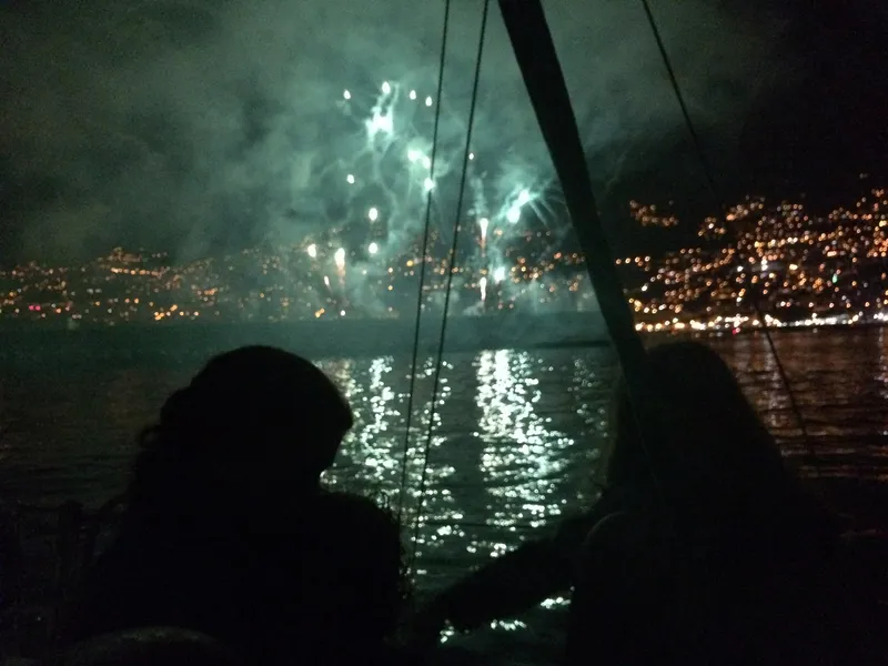 Green fireworks over Funchal, seen from the deck at night